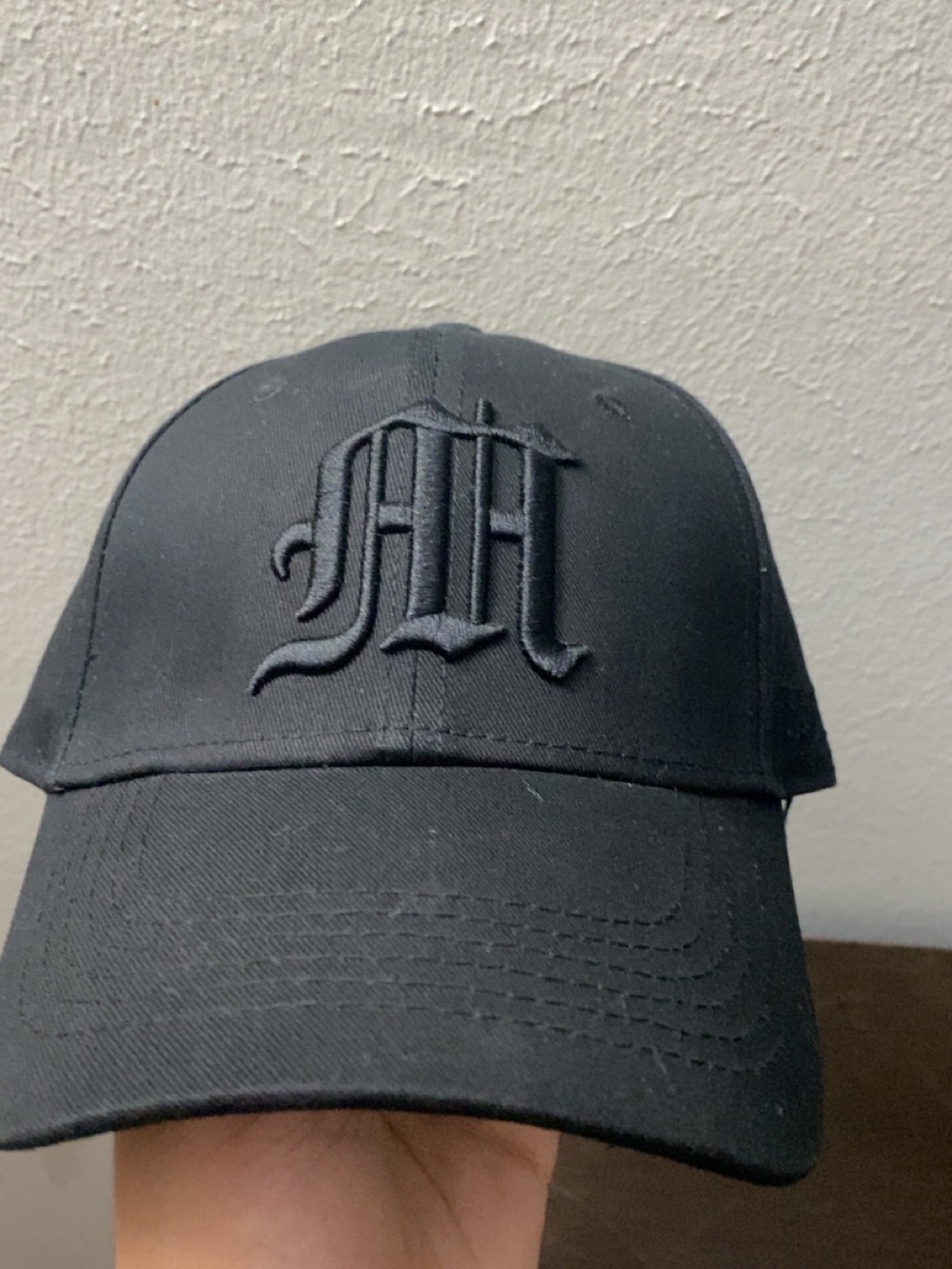 Black Baseball Cap with Embroidered 'M'